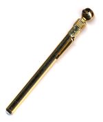 Brass tire-pressure gauge, the groomsmen’s gift at Anne and Bob’s wedding. Courtesy of the Edward F. Gumnick Collection.