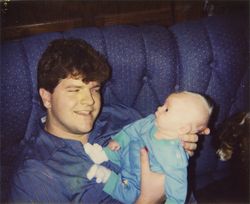 Freshly baptized Robert with The Godfather