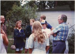 (Left to right) Uncle Karl with Laura, Jane, Ed, cousin Karl, and Dad at Gumnick Family Reunion 1986 in Middle River. The two girls with their backs to the camera are two of cousin Linda’s daughters.